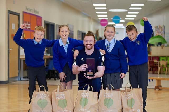 Youngsters at Layton Primary School opened the new Bispham Aldi store with former Team GB athlete Daniel Purvis.