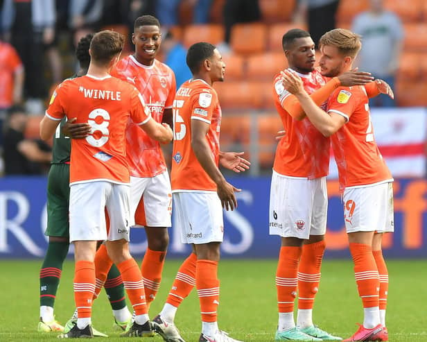 Blackpool's players celebrate their third win from their last four games