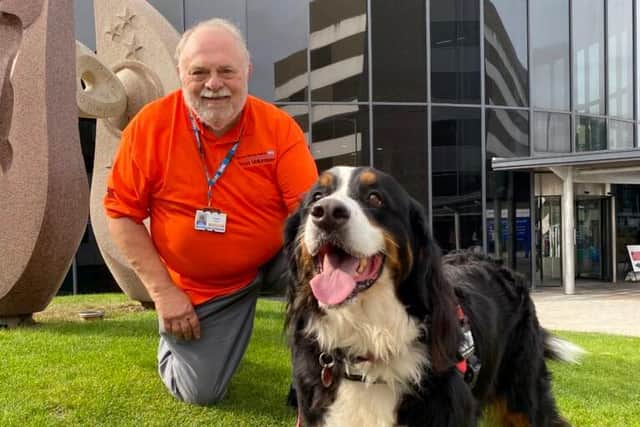 Betty the therapy dog with her owner Graham Curry. Pic: Blackpool Teaching Hospitals