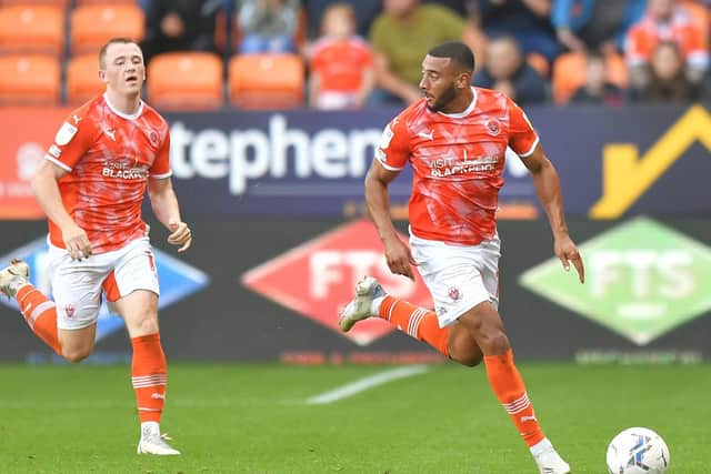 Keshi Anderson (right) is yet to score in the Championship and Shayne Lavery (left) scored Blackpool's winner against Barnsley on Saturday