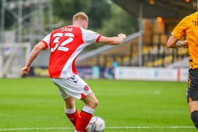 Paddy Lane equalised for Fleetwood at Cambridge with his first goal in senior football