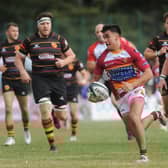 Fylde's Tane Bentley races clear for the first of his three debut tries