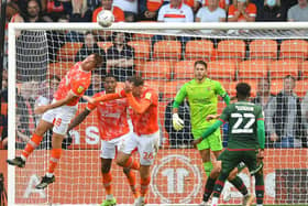 Airborne action as Blackpool defend a set-piece against Barnsley on Saturday