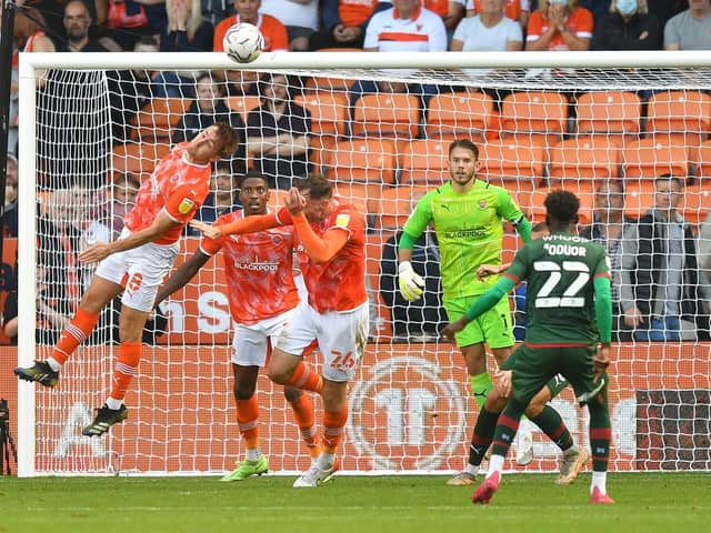 Airborne action as Blackpool defend a set-piece against Barnsley on Saturday