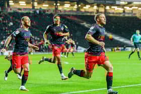 Dan Batty celebrates his late Fleetwood equaliser at MK Dons