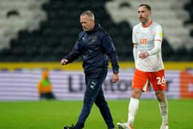 Neil Critchley can't hide his disgust as he trudges off the pitch