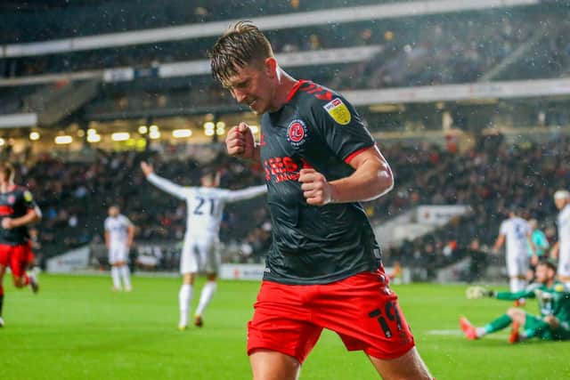 Ged Garner celebrates his second goal as Fleetwood boss Simon Grayson's planning paid off at Stadium MK