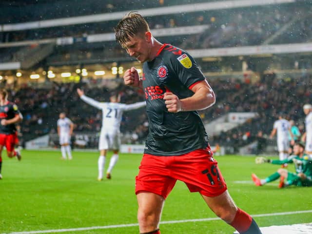 Ged Garner celebrates his second goal as Fleetwood boss Simon Grayson's planning paid off at Stadium MK