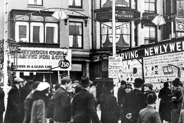 Blackpool was no stranger to sideshows. This picture from the 1920s shows an advertising board to see newlyweds starving themselves on the Golden Mile. They did it to earn money for their first home.