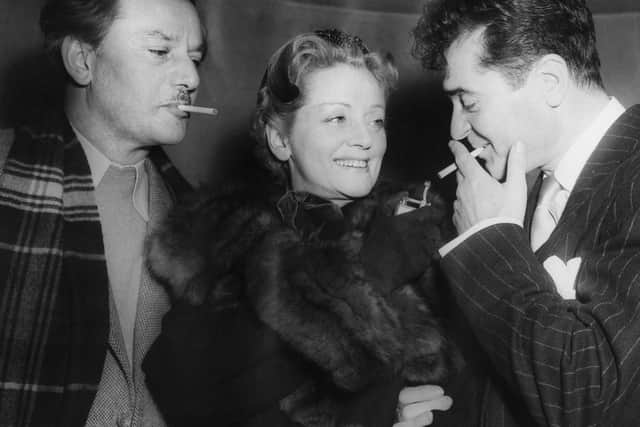 English actress Evelyn Laye with actors Anton Walbrook (left) and Francis Lederer (right) 1955. Photo: Getty Images