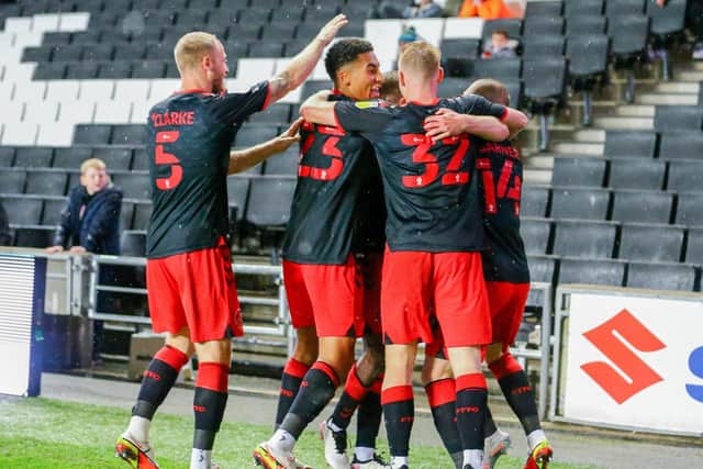 Simon Grayson wants to see Fleetwood maintain their free-scoring, exciting brand of football but also tighten up at the back