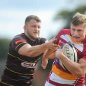 Tom Grimes received a challenge that saw a Rotherham player sinbinned