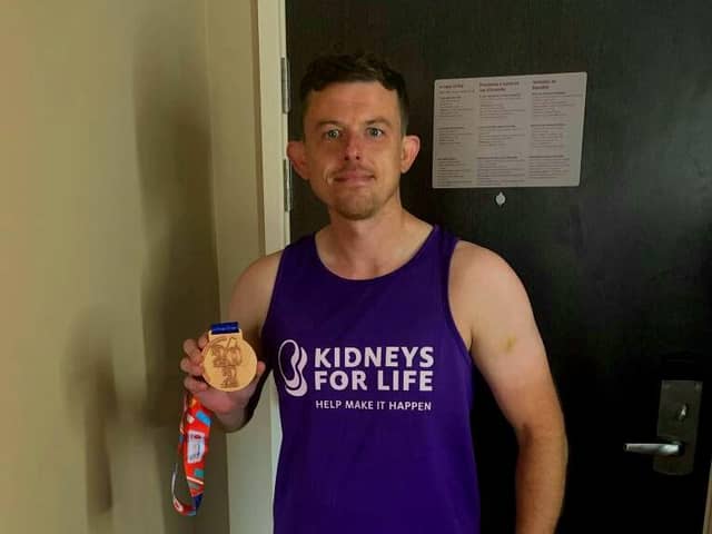 Michael Belk of Fleetwood with his London Marathon medal