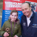 Myles Taylor, from St Annes, receives his trophy from motoring journalist and broadcaster Quentin Willson. Myles, 12, came third in the 10-13 age category in the Young Driver Challenge 2021. It was the second time Myles had qualified for the final, which finds the best young drivers from across Britain