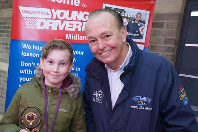 Myles Taylor, from St Annes, receives his trophy from motoring journalist and broadcaster Quentin Willson. Myles, 12, came third in the 10-13 age category in the Young Driver Challenge 2021. It was the second time Myles had qualified for the final, which finds the best young drivers from across Britain
