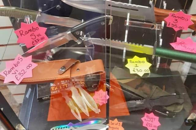 Knives being sold inside The Joke Shop, Waterloo Road, South Shore