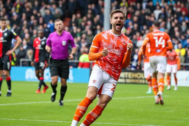 Luke Garbutt celebrates Blackpool's second goal during the win against Blackburn Rovers