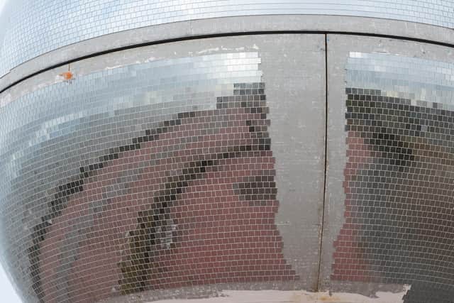 A section of tiles on the Mirror Ball still needs completing
