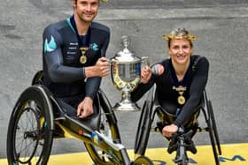 Swiss athletes Marcel Hug and Manuela Schar dominated the men's and women's wheelchair races at the Boston Marathon
