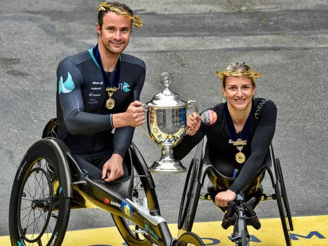 Swiss athletes Marcel Hug and Manuela Schar dominated the men's and women's wheelchair races at the Boston Marathon