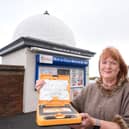 Gill Gallagher with the defibrillator at Dolly's in Fleetwood