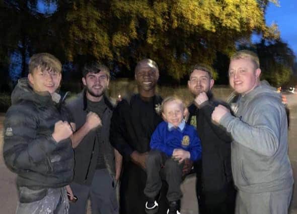 British boxing legend Chris Eubank takes time out from visiting family in Kirkham to pose for pictures with fans yesterday (Thursday, October 14)