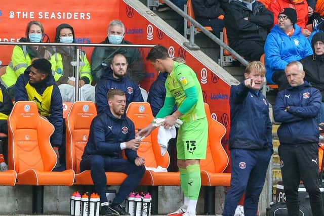 Stuart Moore comes off the bench to replace Chris Maxwell in Blackpool's last game against Blackburn Rovers