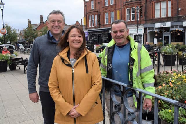 Andrew Whitaker of Lytham Business Partnership, Fylde Council leader Coun Karen Buckley and contractor Gary Carr in Clifton Square, Lytham