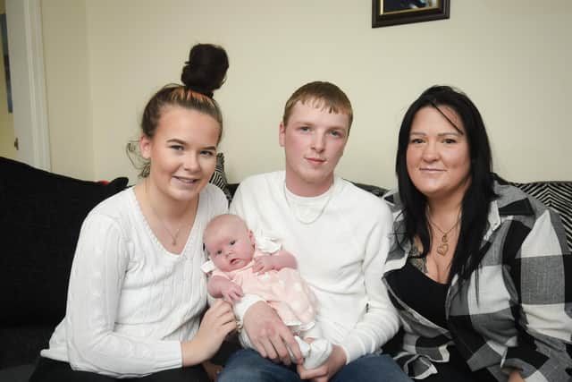 Blain Hodgkinson with his newborn daughter Gia, partner Charlotte Morrison and mum Caron Hodgkinson.