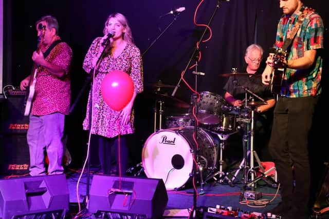 The Love Cats on stage at the charity concert tribute to Rachel Turner, with Rachel’s friend and The Love Cats lead singer Franki Hardisty pictured centre