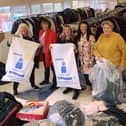 Rotary volunteers sifting through coats collected in Lytham in 2019.