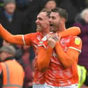 Richard Keogh and Gary Madine celebrated Blackpool's famous win