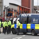 Preston North End supporters have criticised Lancashire Police's handling of their match-day visit to Blackpool, with some describing it as "an absolute shambles" and the "worst policing of a football match ever"