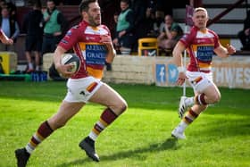 Greg Smith races clear for Fylde's first try, supported by Tom Carleton who would score three of his own against Bournville