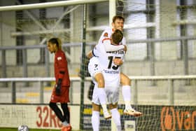 Ben Tollitt celebrates his second goal against Spennymoor with Jack Sampson
Picture: STEVE MCLELLAN