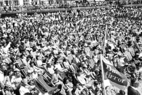 Thousands of visitors taking in the sun on the sands in Blackpool decades ago