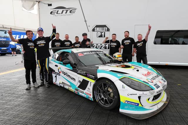 Adam Poulton (second left) celebrates Ginetta championship glory with his Elite Motorsport team at Brands Hatch