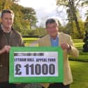Lytham Hall manager Peter Anthony (left) receives the cheque for the record donation from plays organiser Julian Wilde