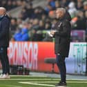 QPR boss Mark Warburton watches on alongside Neil Critchley