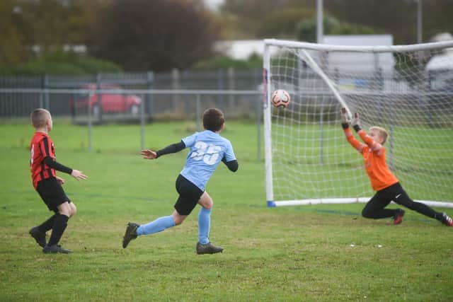 Under-9s action from Collins Park