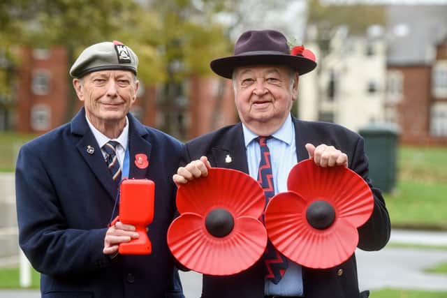 Andy Broadbent and Ed Nash signify that it is 100 years this year since the founding of the Royal British Legion
