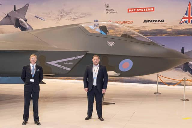 David Morris MP, chairman of the Lancashire All Party Parliamentary Group which visited BAE Systems and Antony Higginbotham MP, at the BAE Systems Warton site, with a prototype of the Tempest combat aircraft.