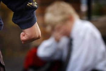 A dozen Blackpool schoolchildren have been excluded for bullying