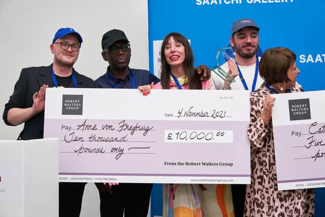 Garth Gratrix, Blackpool born artist, presenting a £10,000 cheque to the winner of the Robert Walters Award for Young Artists 2021 at the Saatchi Gallery, London