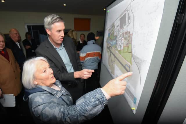 Architect Lawrence McBurney with resident Ann Wragg discuss the plans for the Blackpool Airport Enterprise Zone at a drop-in day for the public