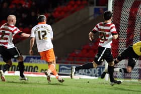 Gary Taylor-Fletcher scores for Blackpool at Doncaster Rovers Picture: Dan Westwell