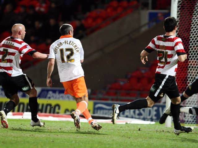 Gary Taylor-Fletcher scores for Blackpool at Doncaster Rovers Picture: Dan Westwell