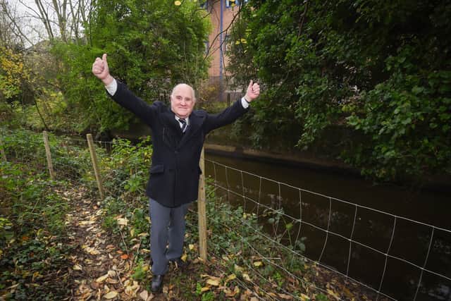 Ron Emery celebrates the installation of the fence at Liggard Brook at Park View 4U.