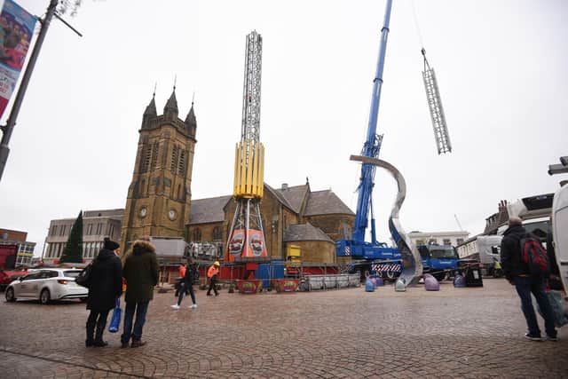 The Star Flyer ride being dismantled in St John's Square on Thursday