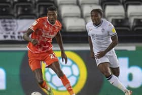 Marvin Ekpiteta was one of three Blackpool players involved in appeals for a penalty